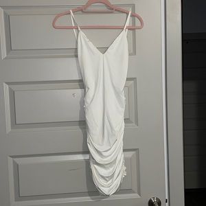White backless mini slinky dress